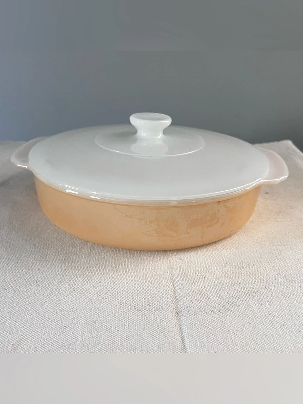 Fire King vintage Lidded Ceramic Casserole Dish in Peach and White